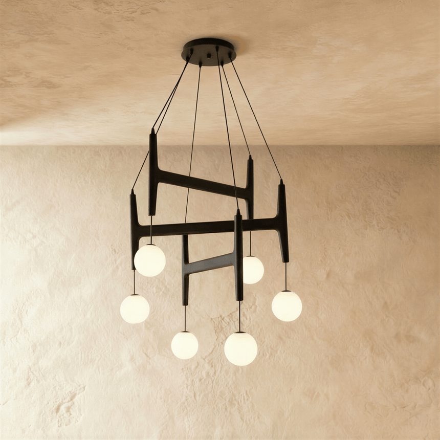 The black wood frame in its six globe version, globes hung at uneven heights
