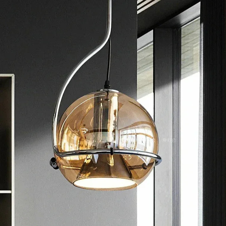 The globe seen in its ring frame against a bright window and plants