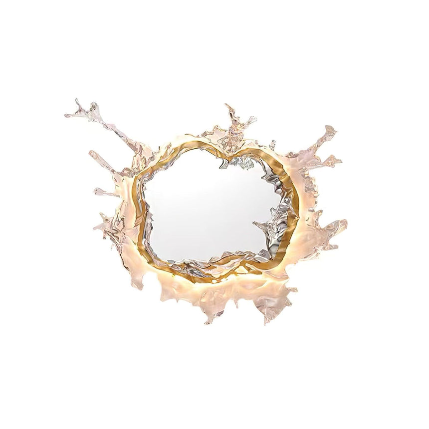 The gold version on a white background, drops reaching out from the frame