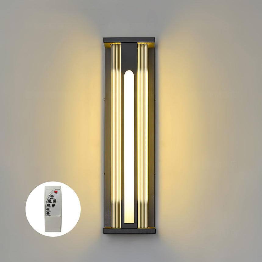 The handheld remote dimmer shown beside the lit body of the fixture