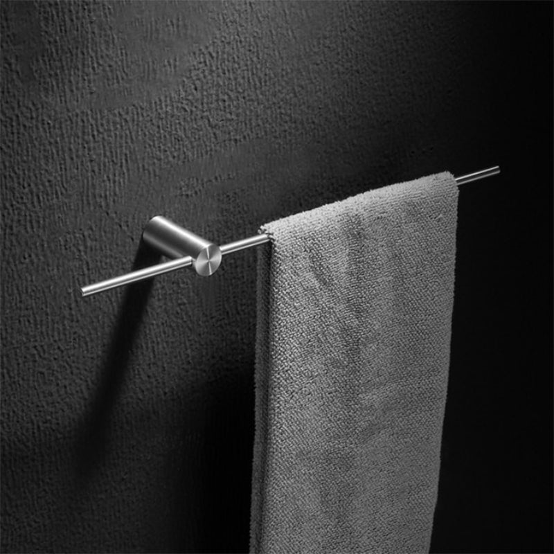 Stainless steel towel bar installed in a bathroom setting