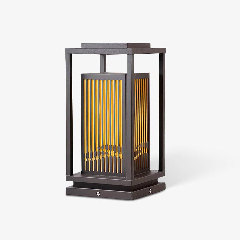 Tall black cage lantern with a lit faux alabaster column held inside