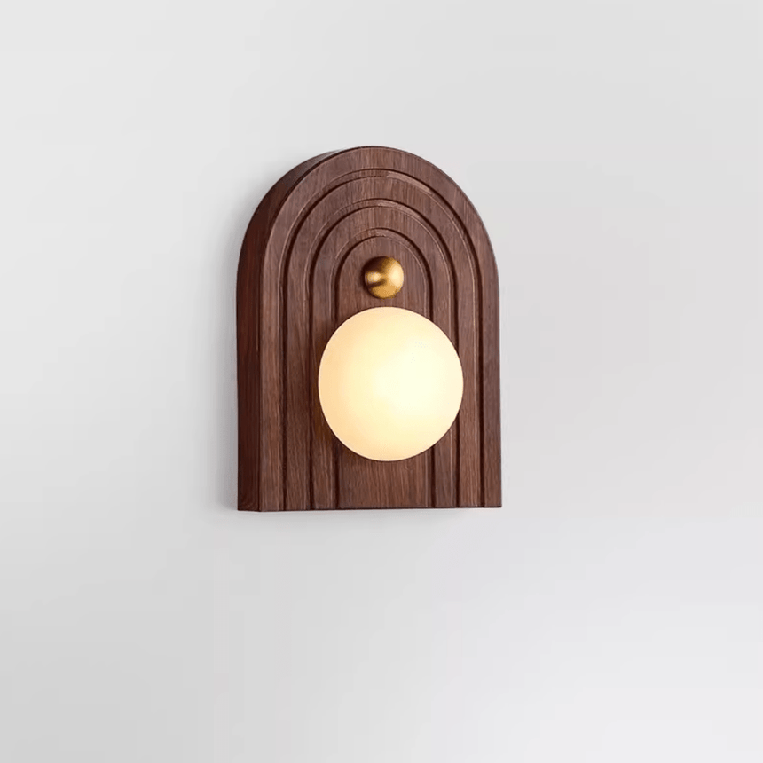 The walnut arch version with a glowing sphere sitting low in the opening