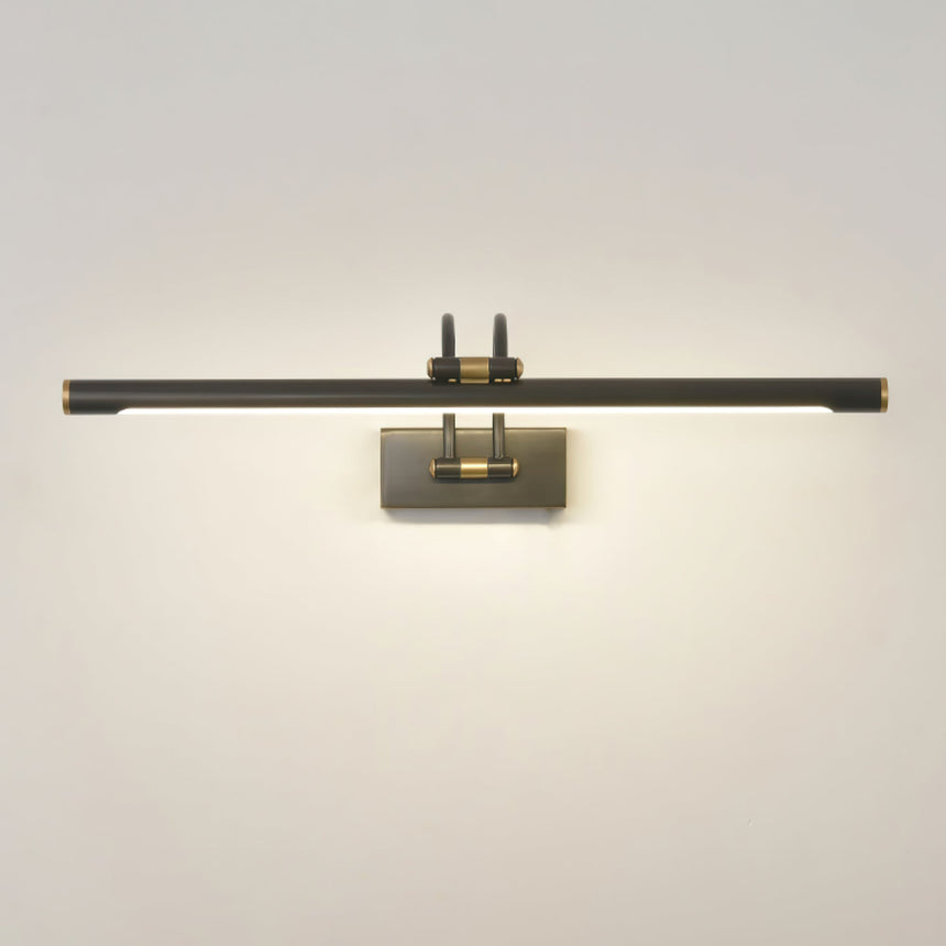 Dark bronze bar lit on a pale wall, the glow spreading down and out from the tube