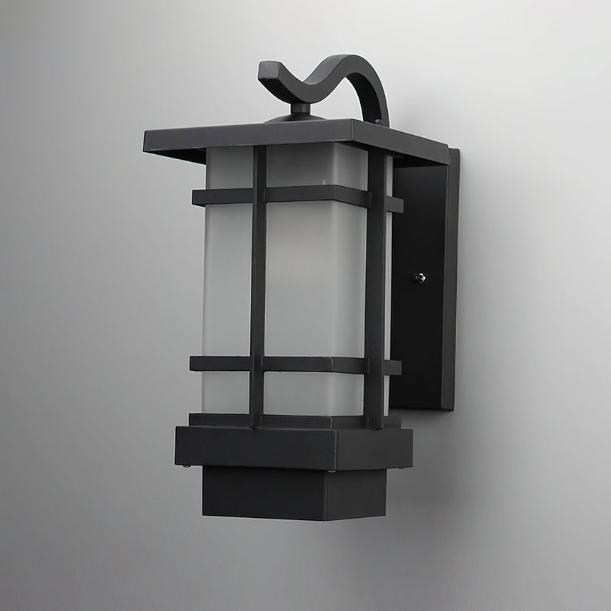 The lantern unlit on a gray background, showing the back plate
