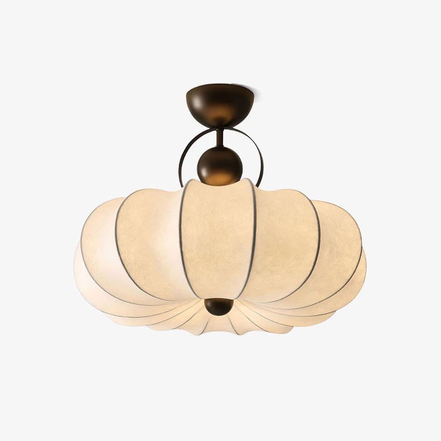 Pleated ceiling light in cream silk with a bronze frame, shown on a plain background