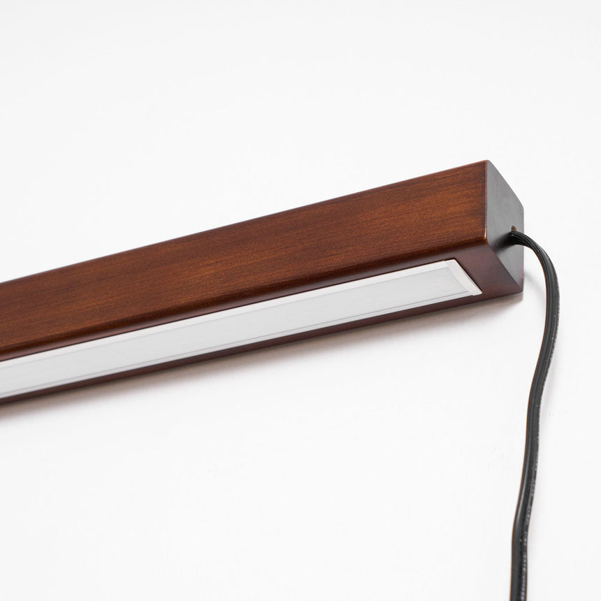 Detail of the bar end showing the cord exit and the slim body