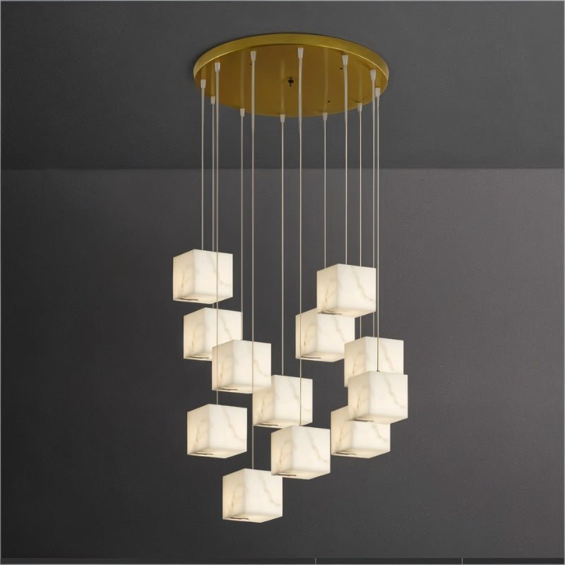 A wide group of lit alabaster cubes at several heights below a brass plate