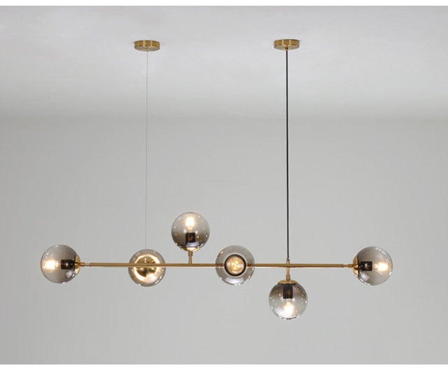 Solara Pendant Light – Mid-Century Amber Glass Design