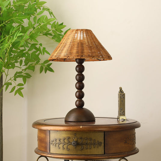 Close view of the stacked bead turnings and the domed walnut foot