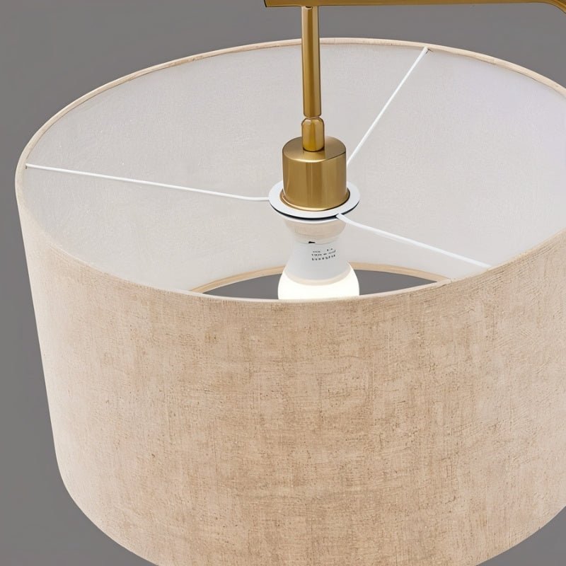 The inside of the drum shade and the socket that holds the bulb at its middle