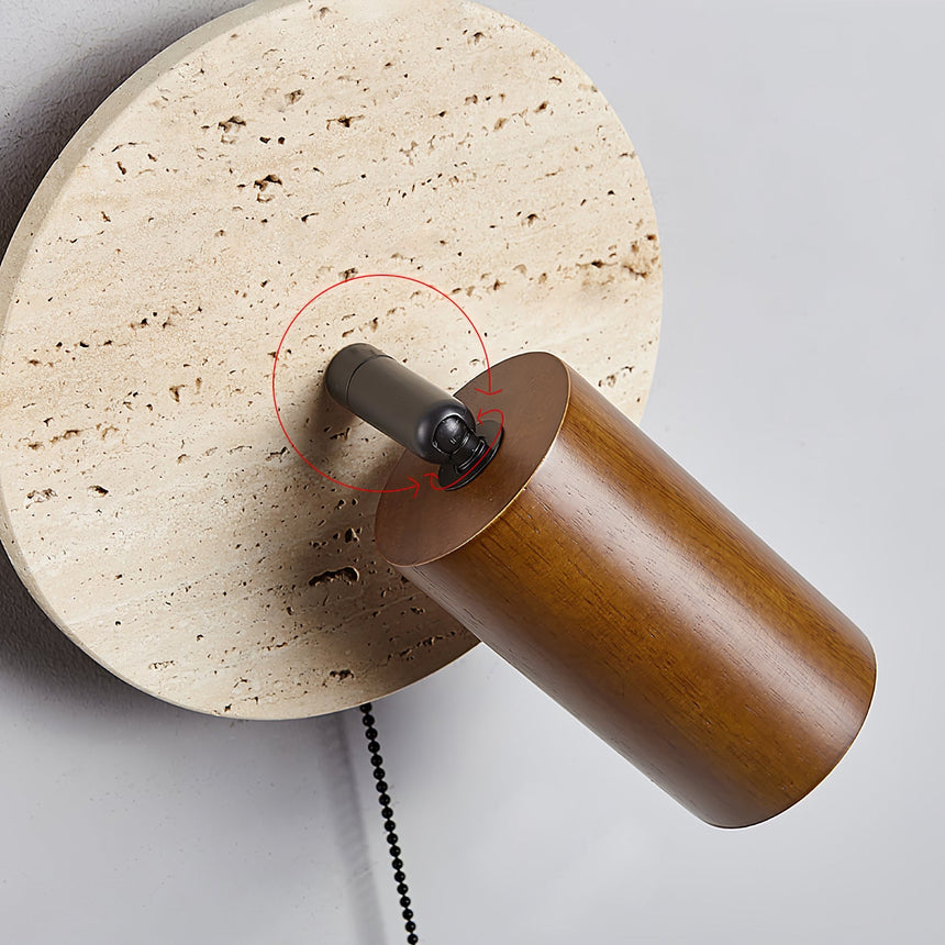 Close view of the joint where the head pivots against the stone disc