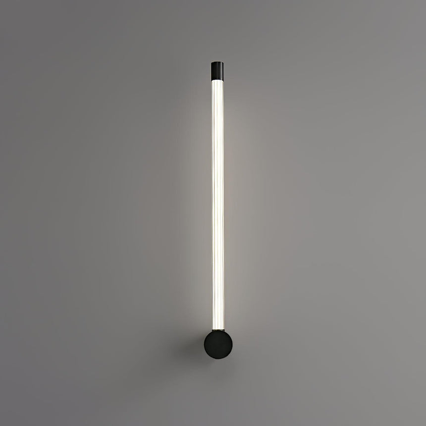 The black version mounted vertically, the tube lit from foot to tip