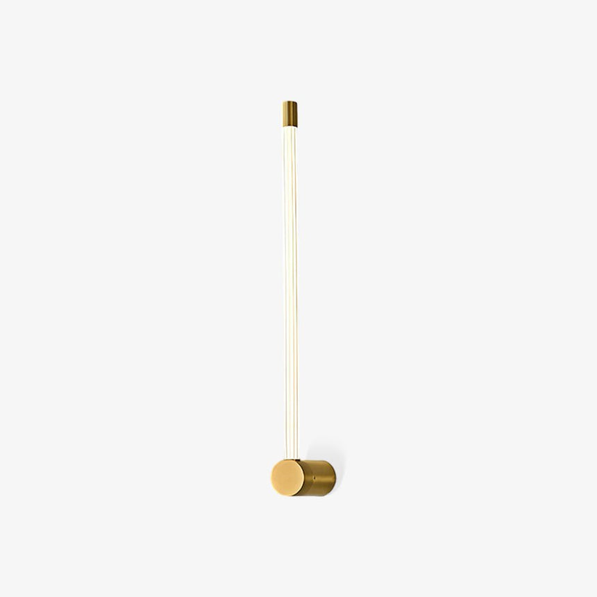 A slim frosted tube rising from a brushed copper foot, lit against pale gray