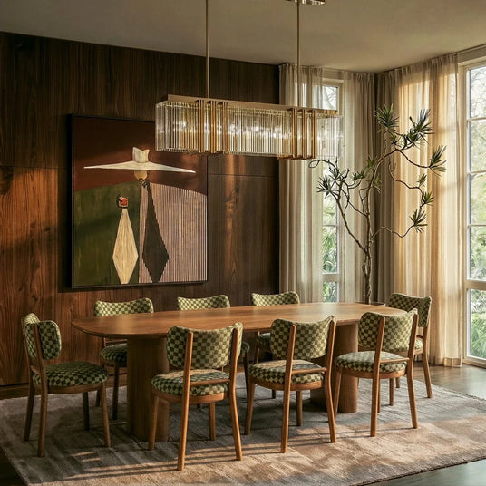 The long version above a dining table with green chairs, artwork and a window