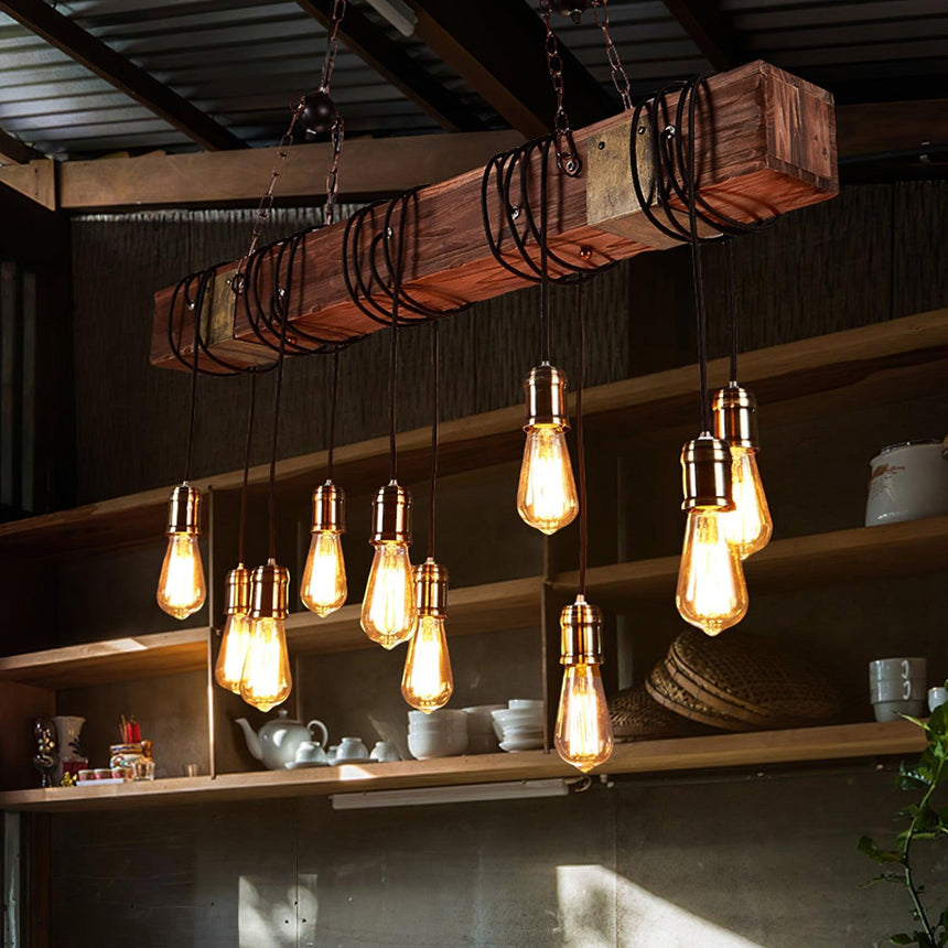 Hung above open shelves holding teapots and bowls in a warm timber room