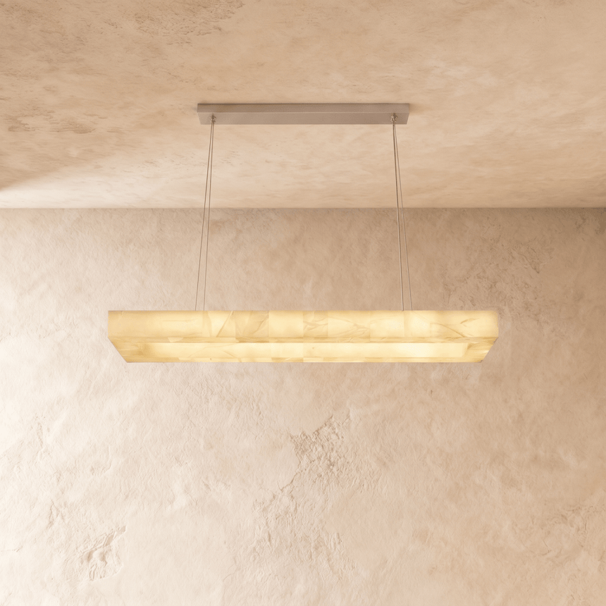 A lit bar with warm veining running the whole length of the face