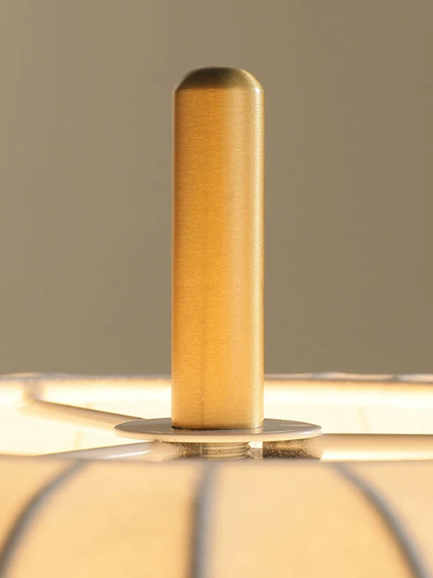 Close view of the plated brass stem standing on its round foot