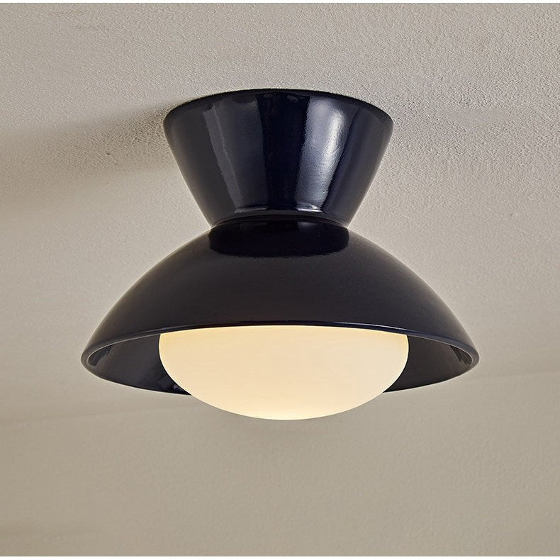 Close view of the black gourd ceiling light and its opal glass dome