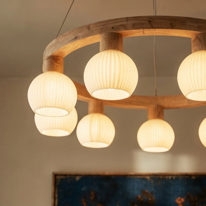 The wood ring seen from below with the ribbed globes hanging inside it