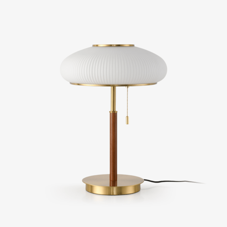 Ribbed glass table lamp with a brass foot and a walnut stem, plain ground