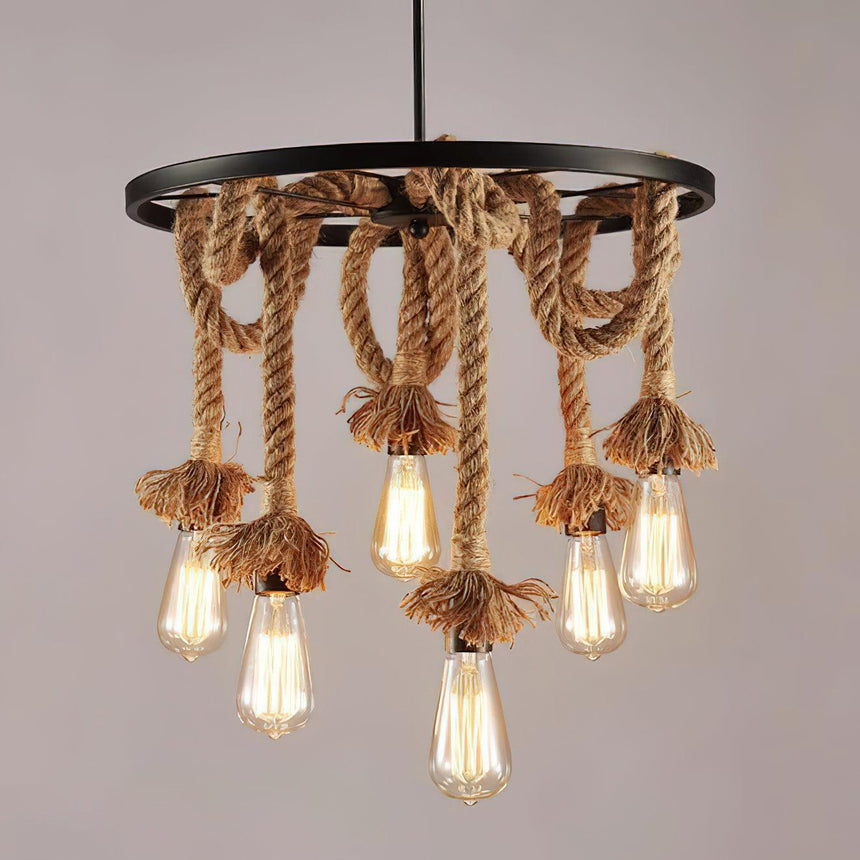 The eight light build lit warm, swags ringed around the iron frame