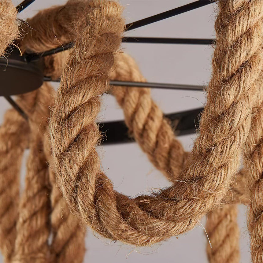 Two lengths of twisted hemp rope shown close against the frame