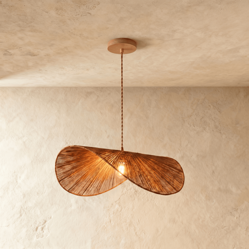 The same twin disc form in a darker rust toned hemp rope