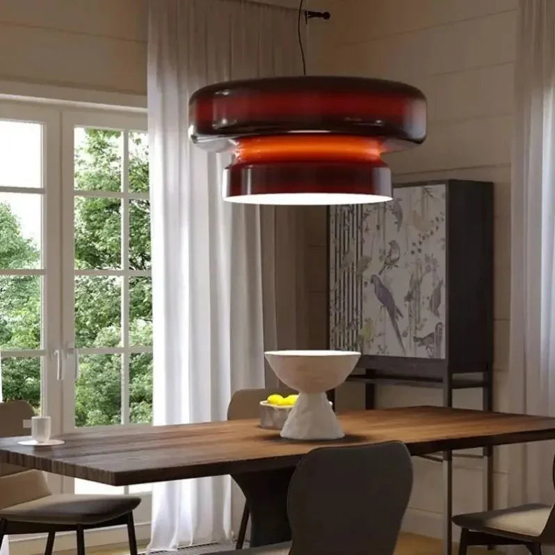 Tinted glass shade lit in a warm interior