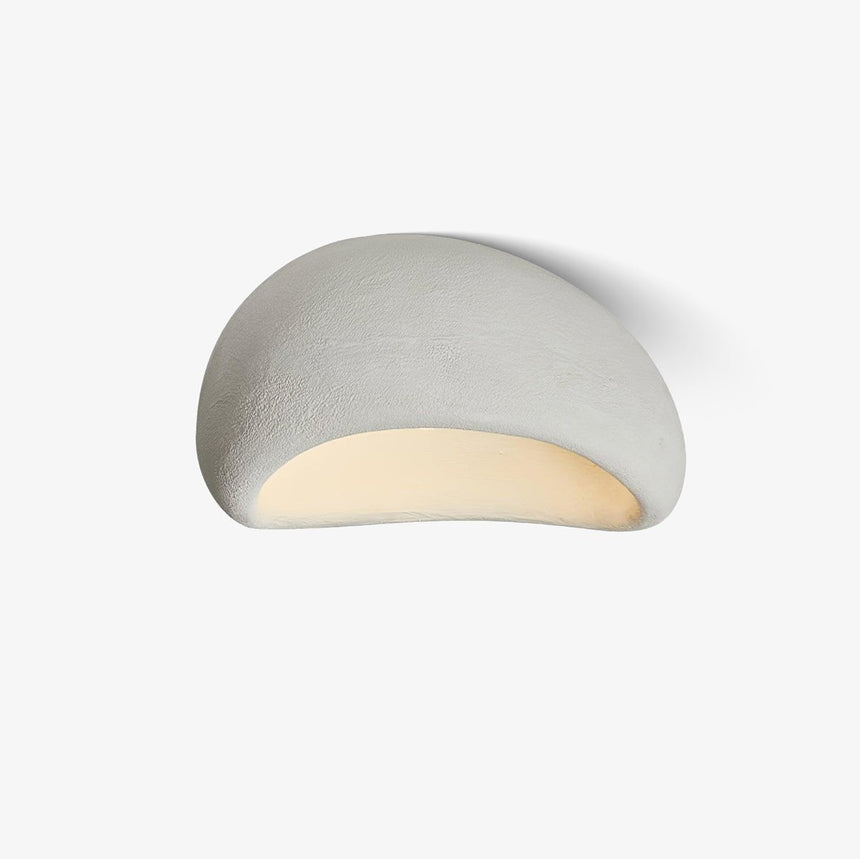 Round flush mount ceiling light with a textured white dome, shown on a plain background