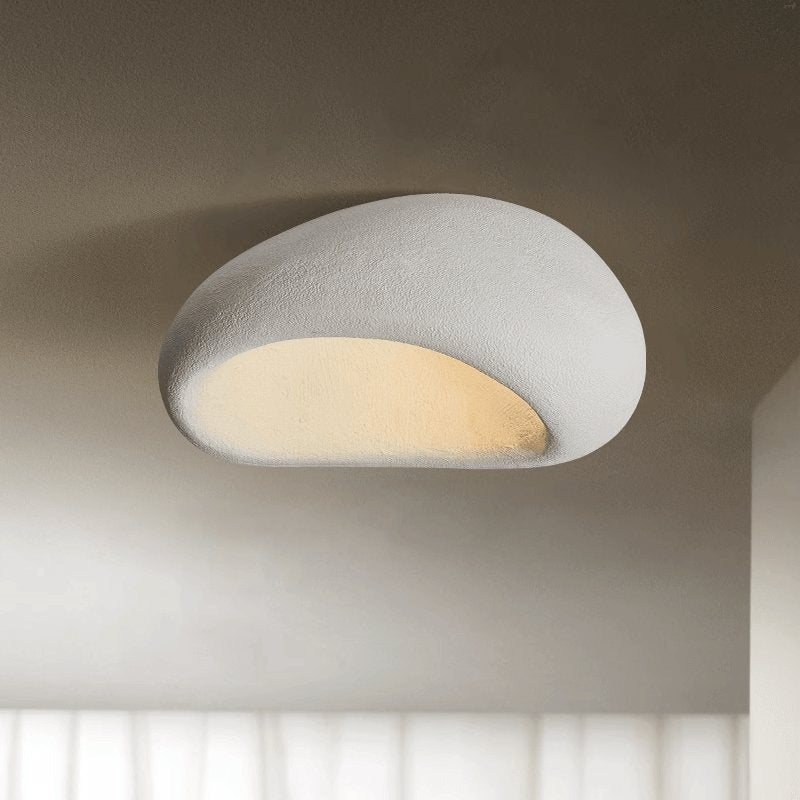 White texture dome ceiling light shown on its own against a plain background
