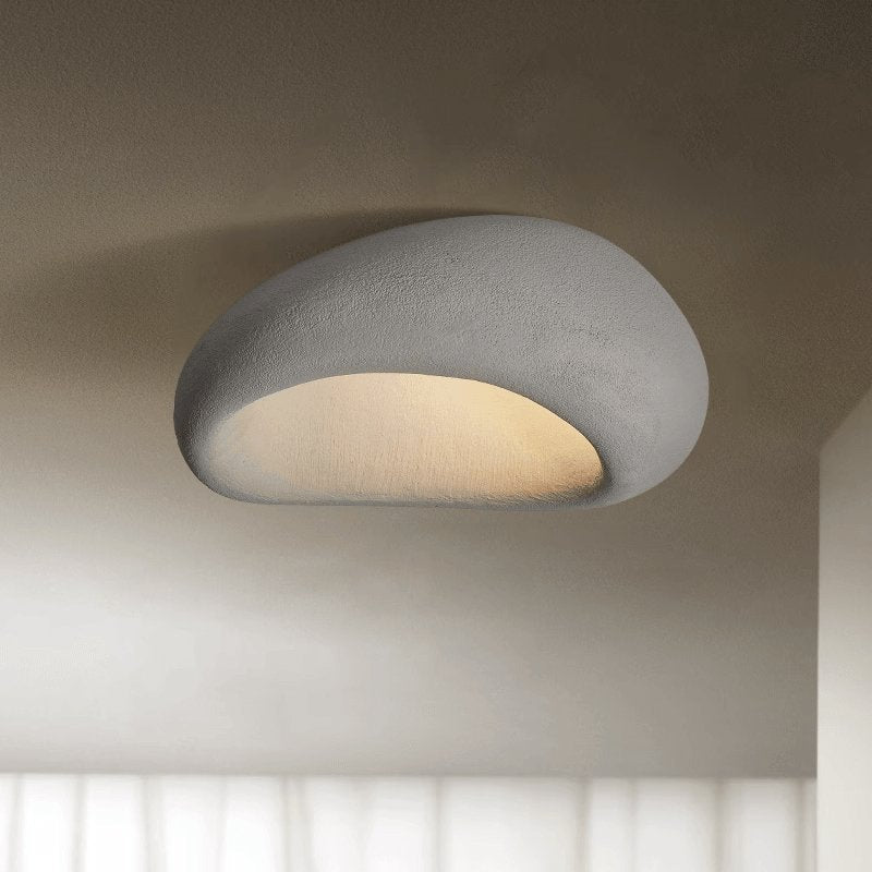 Cement gray dome ceiling light shown on its own against a plain background