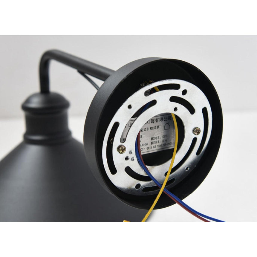 The back of the wall plate showing the mounting bracket and the wiring leads