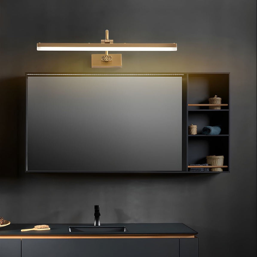 Gold antler bar lit above a dark cabinet and a wide screen in a dark room