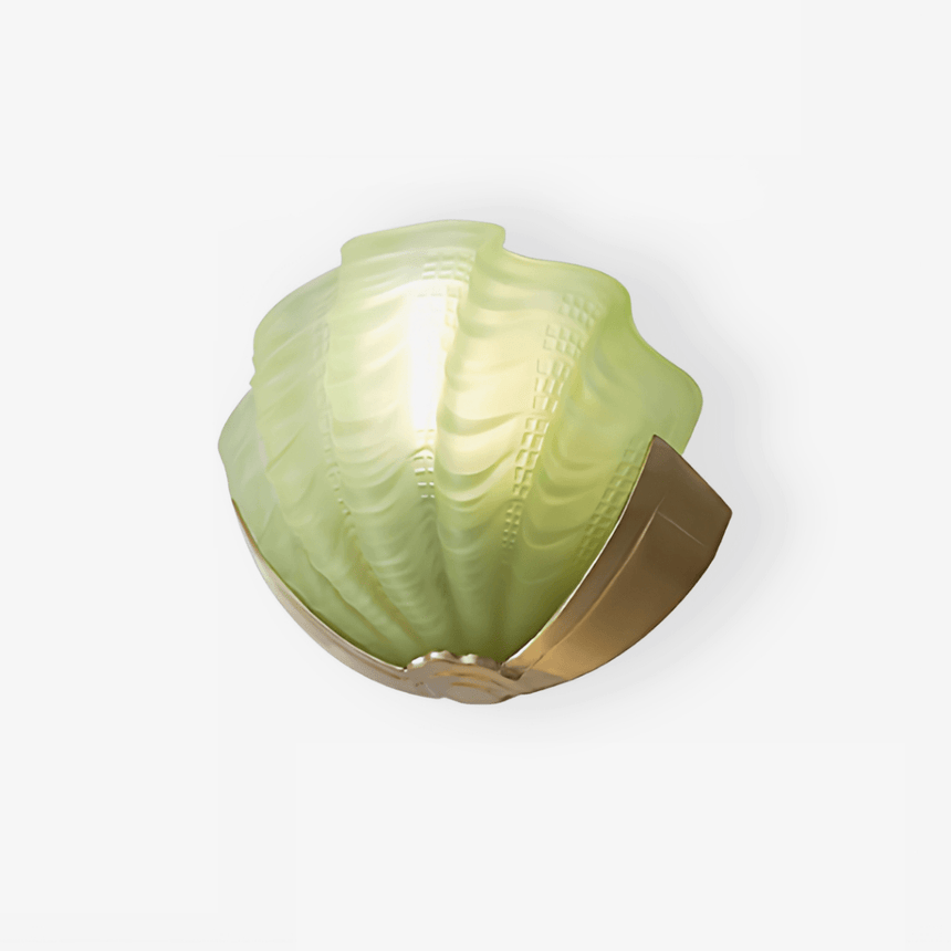 Shell wall sconce with a green molded glass scallop shade in a gold bracket