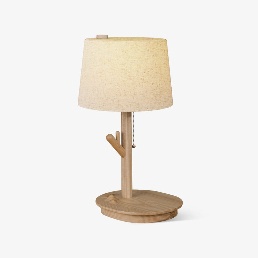 Branch stem side table lamp seen from an angle, the tray base visible