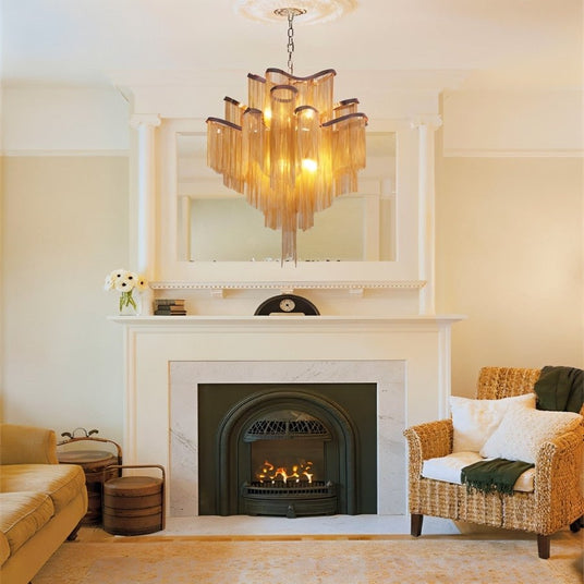 The gold version above a white fireplace with a mantel mirror and an armchair