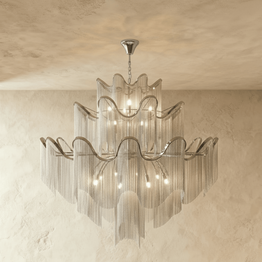 The largest silver version, five tiers of bands over long curtains of chain