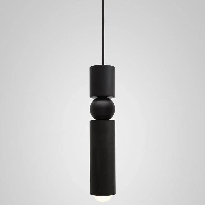 The black single pendant shown against a pale background