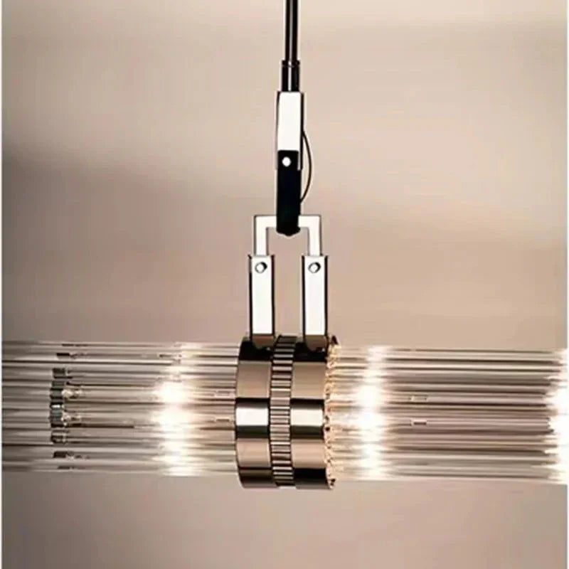 Close view of the chrome collar gathering the glass tubes together