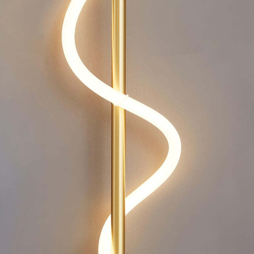 Close view of the lit band curving around the gold rod