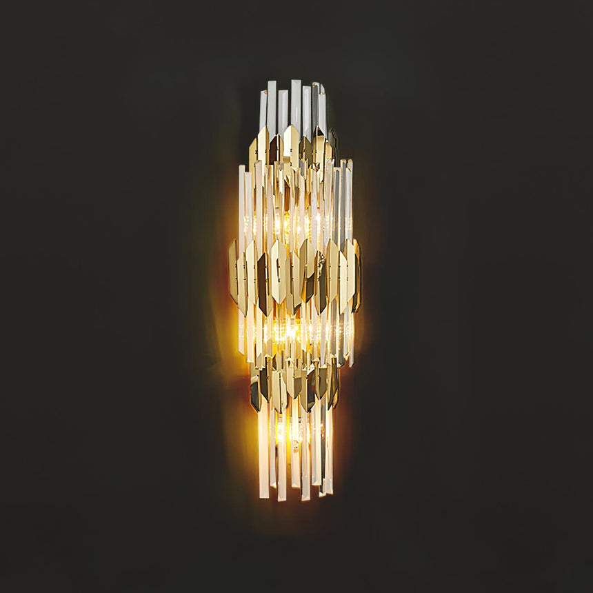 The sconce lit warm on a dark wall, the crystal prisms glowing between the blades