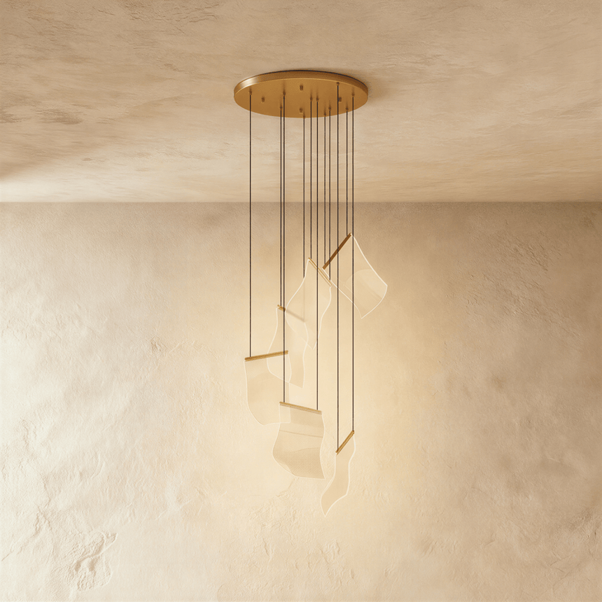 The shortest version, a few lit sheets falling from a round gold canopy