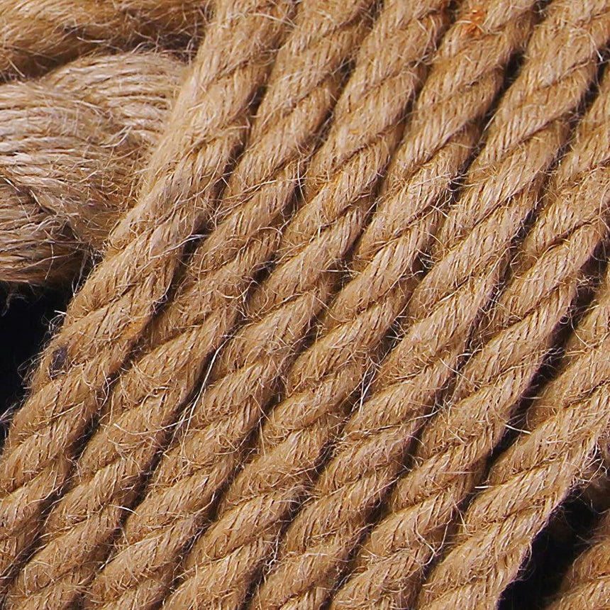 Coils of hemp rope shown close, the twist of the strands in view