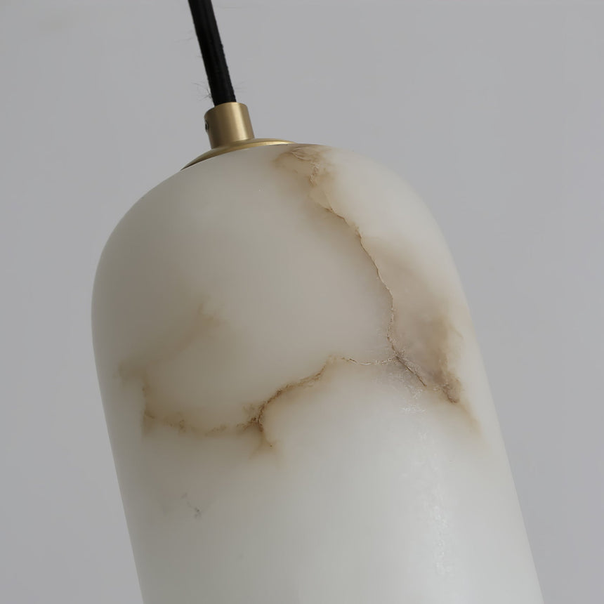Close view of the carved stone shade and its brown veining