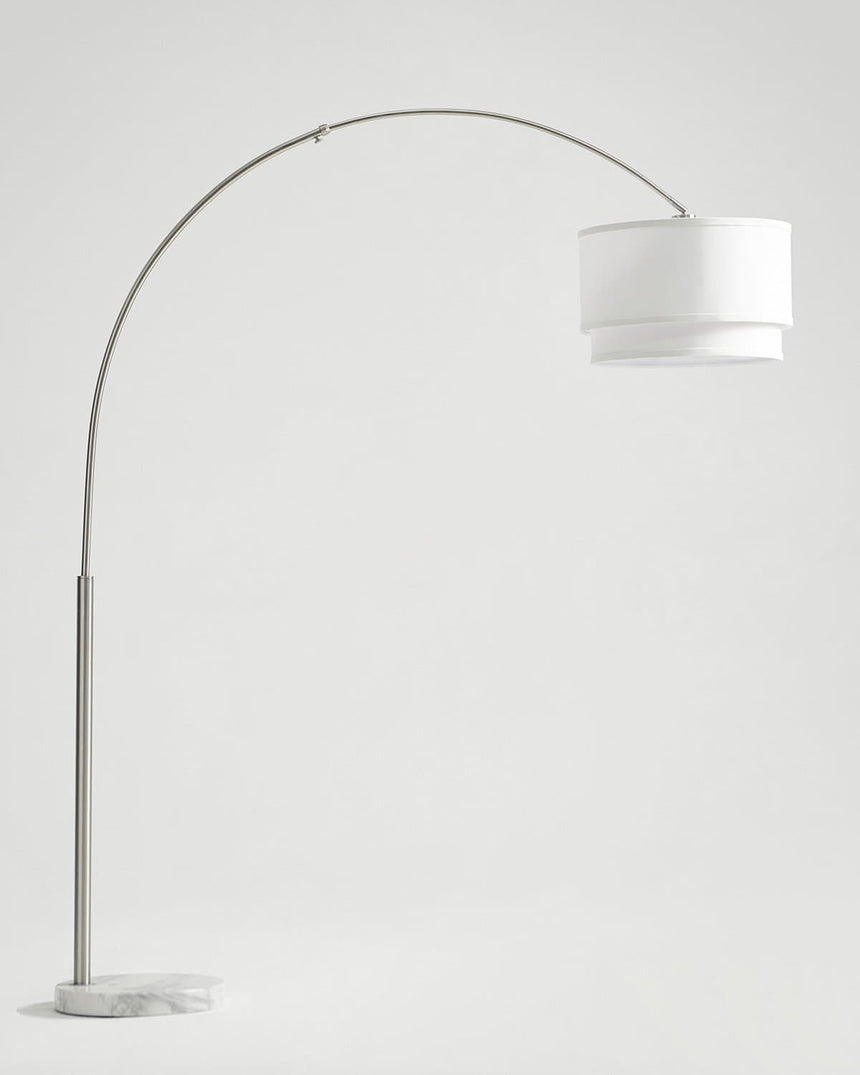 Tall satin nickel arc floor lamp with a two tier white linen shade