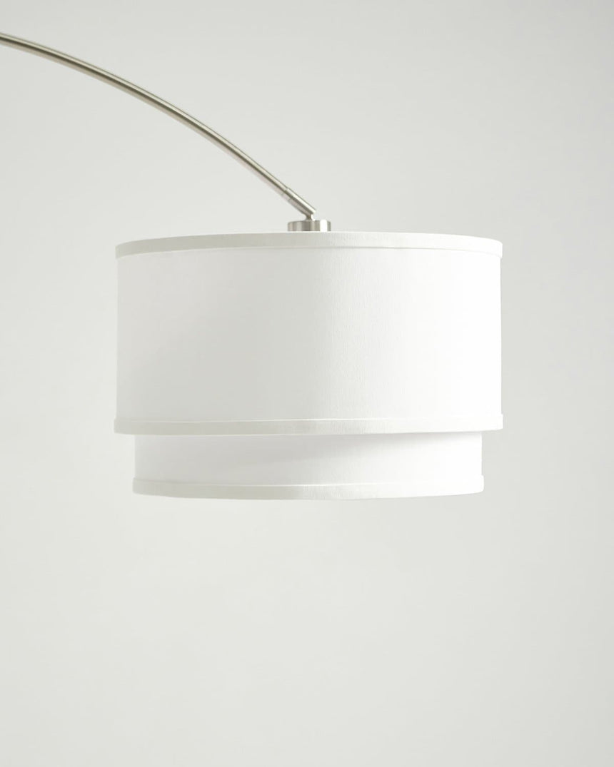 The white two tier linen drum seen close, the lower tier stepped in