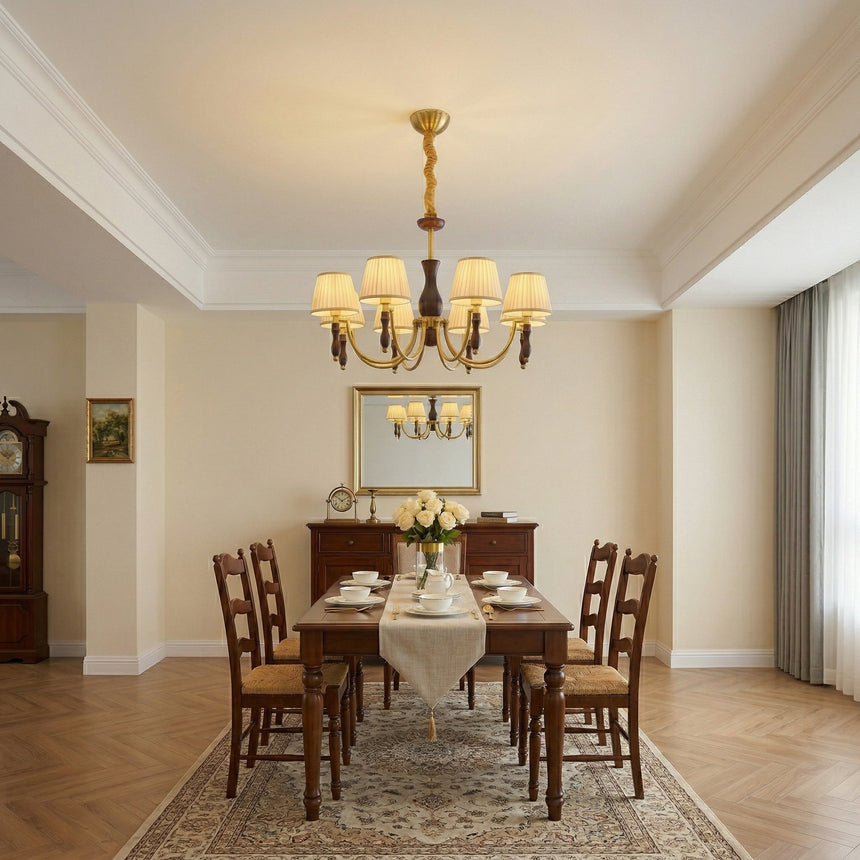 The shades lit above a set table with a mirror on the wall behind