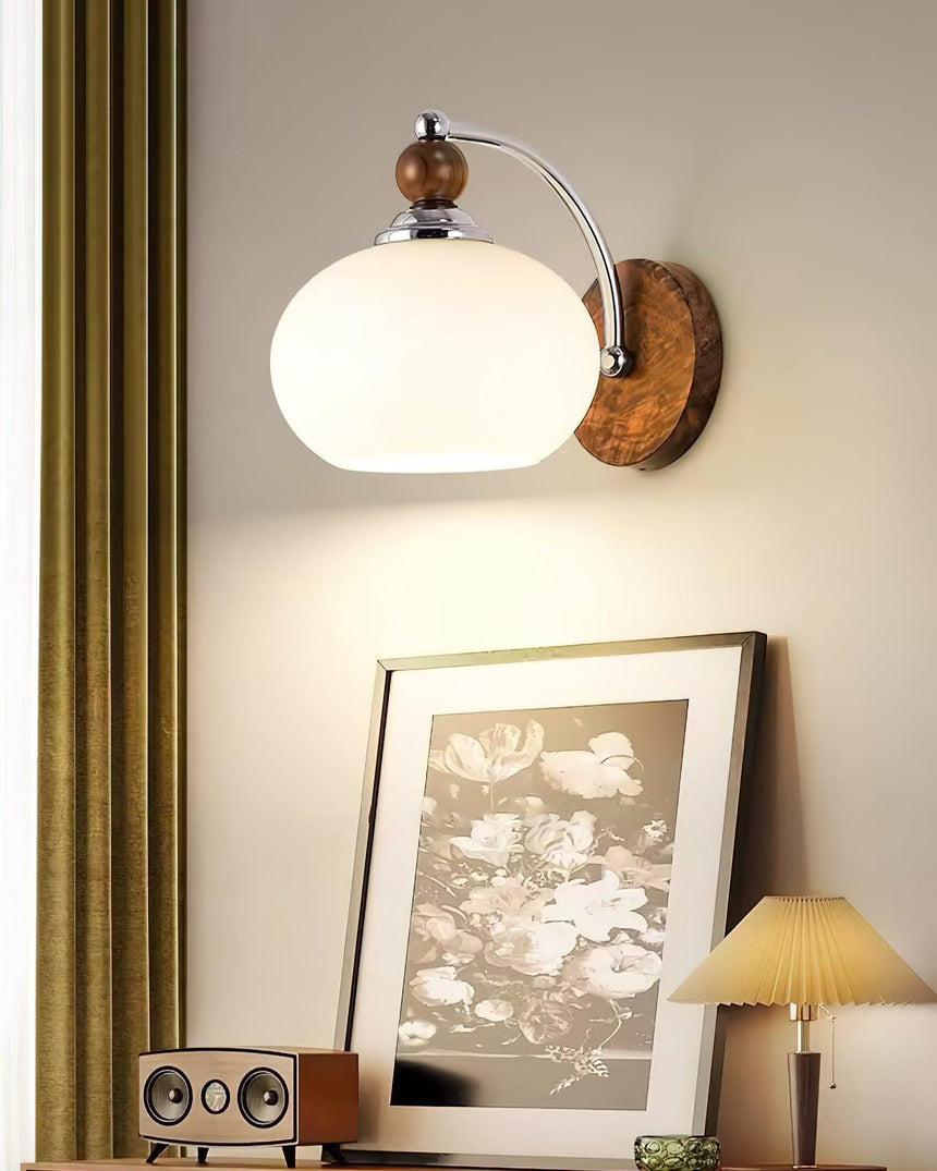 Traditional wall sconce with a wood shade