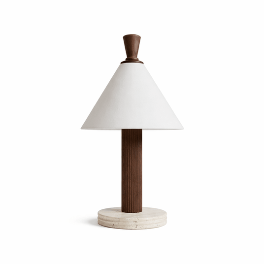 The honed travertine disc base and the fluted column seen close